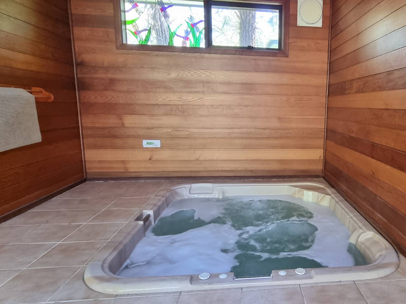 Indoor Spa, opens up onto our back deck