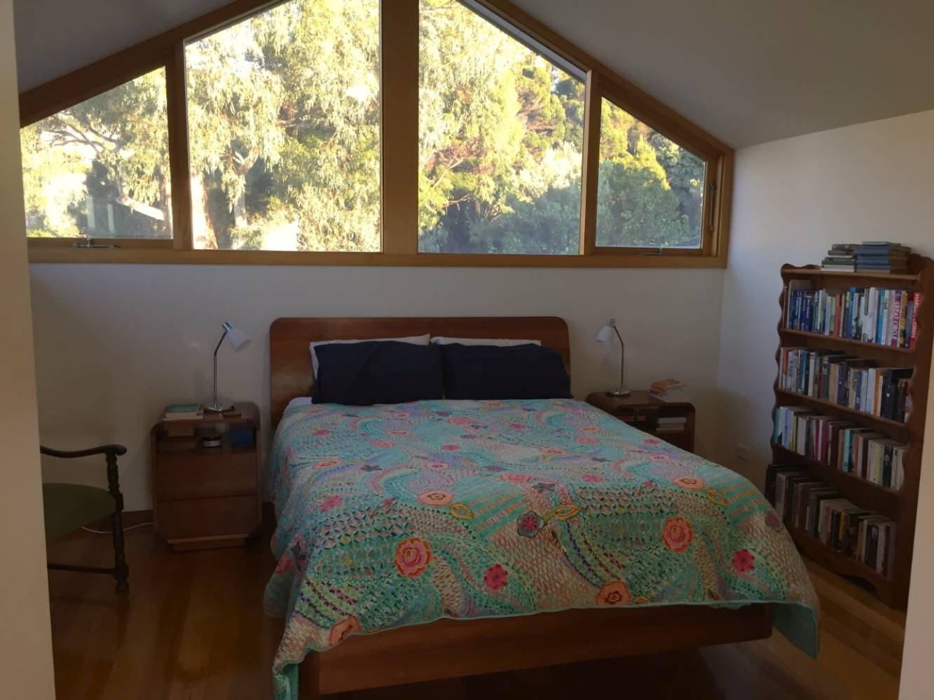 upstairs "tree house" bedroom with queen bed