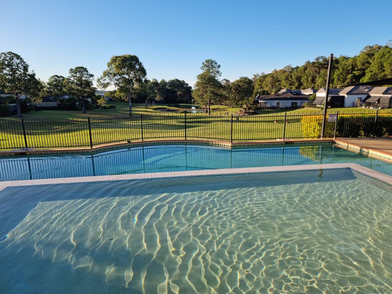 Community Swimming Pool overlooking the Golf Course