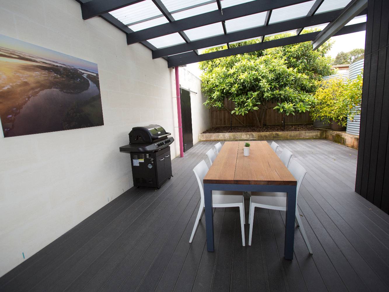 Rear deck, sheltered from wind, BBQ, Japanese bath house, great entertaining area.