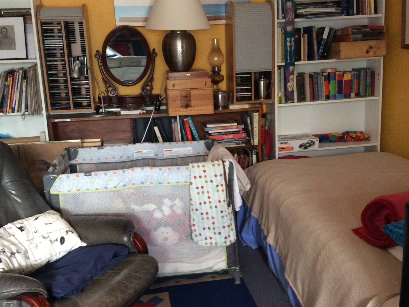 The busy study has an open fireplace, a single bed and room for a cot...and lots of books!