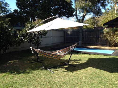 Market umbrella and hammock - Backyard