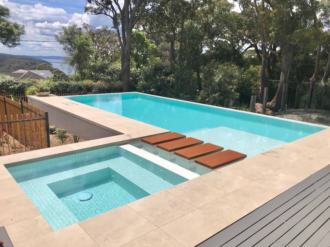 Brand new double infinity edge pool and spa.  Lovely all year round!