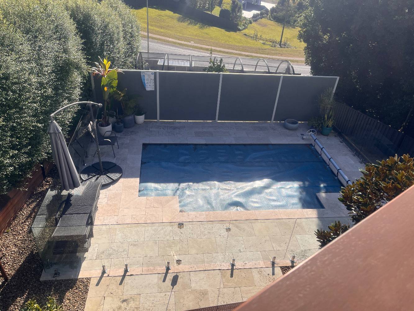 Pool (cover on) veggie garden at rear