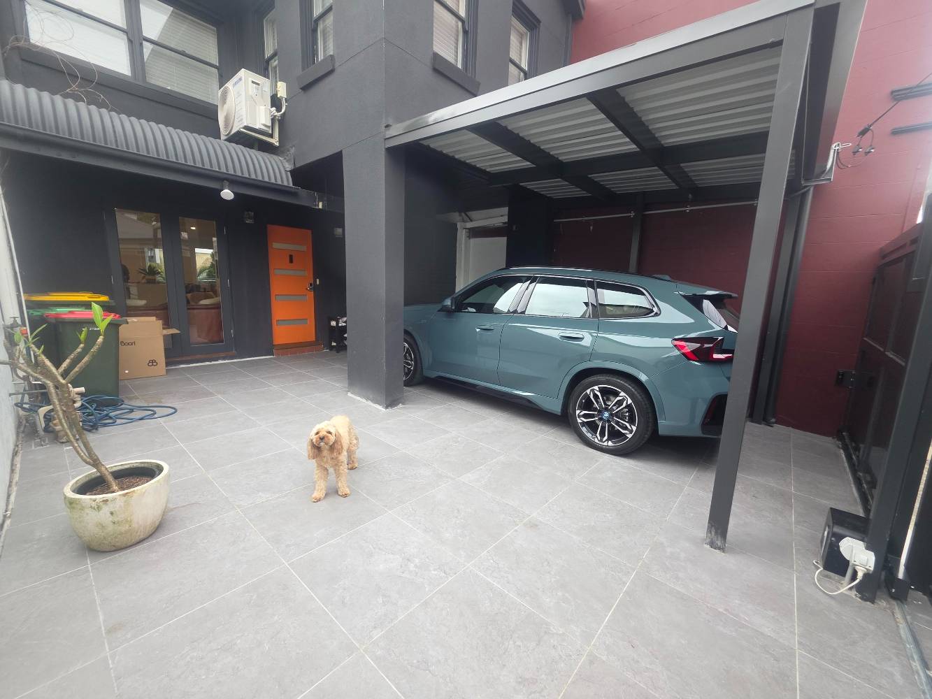 Carport & front courtyard