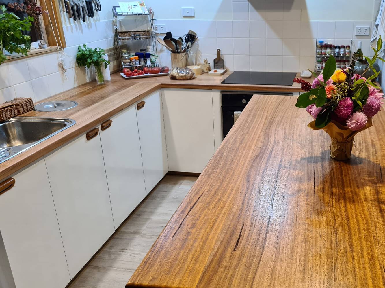 A new kitchen with island bench and Tas oak benchtops