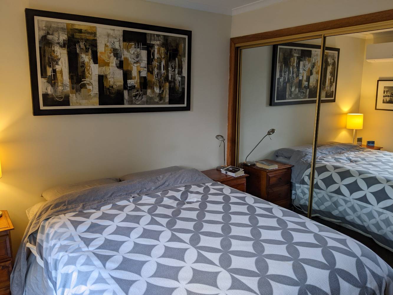 Main bedroom with built in mirrored wardrobe