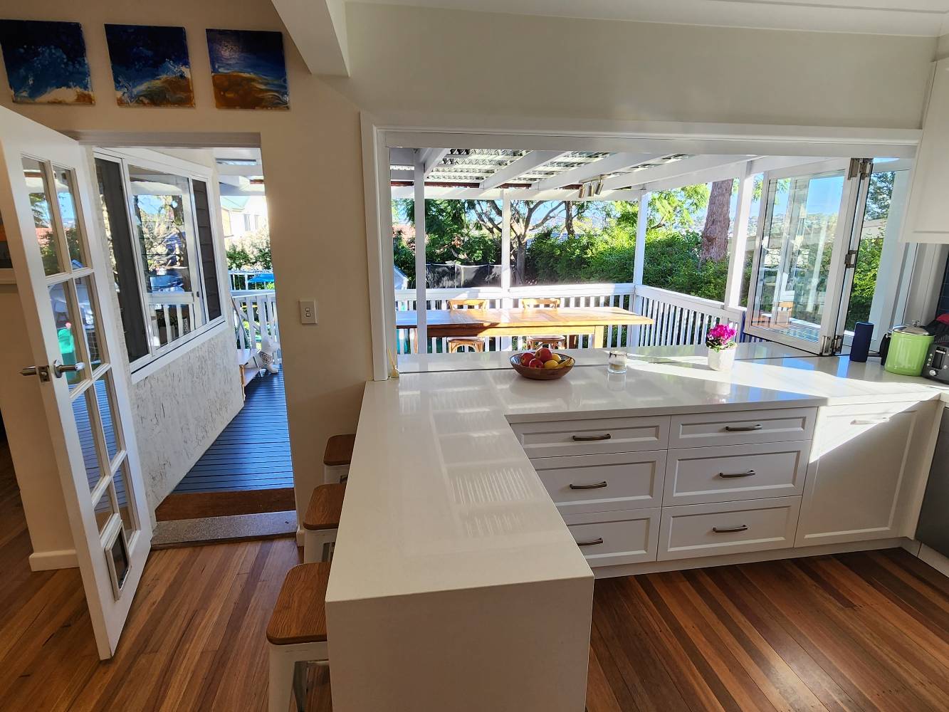 Open up the kitchen windows onto the deck