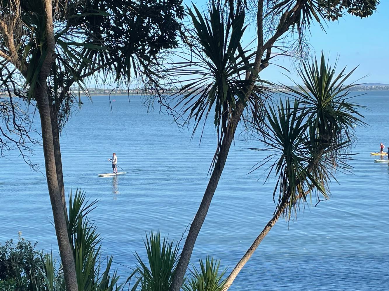 Paddle boarding in front of the cottage
