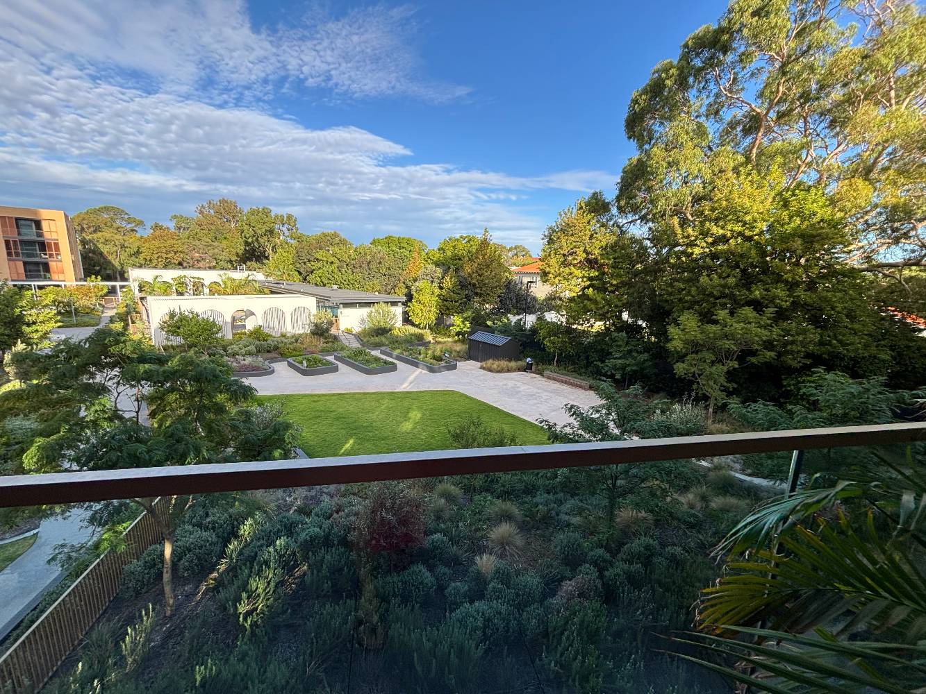 View over community garden/pool from balcony